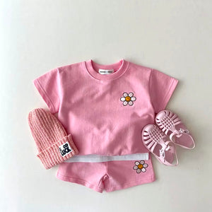 Completino Pantaloncino Fiore Sorridente - Piccoli Sensi™